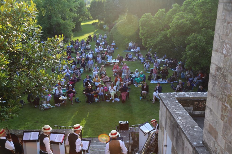 Seated audience on lawn